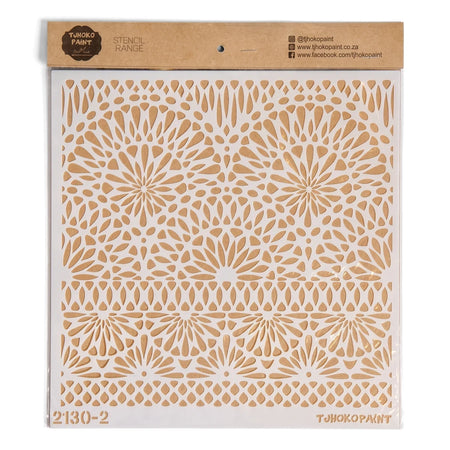 White Tohoko Paint stencil 2130-2 featuring intricate floral and geometric patterns, packaged in clear plastic with a brown