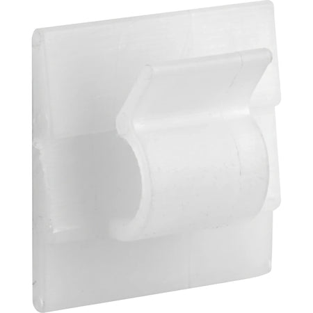 Close-up view of a single translucent white plastic cable clamp mount pad, showing its square adhesive base and curved