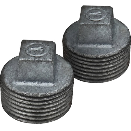 Two 3/4 inch galvanized plugs, made of durable metal with threaded sides and a square head, displayed in a pair.