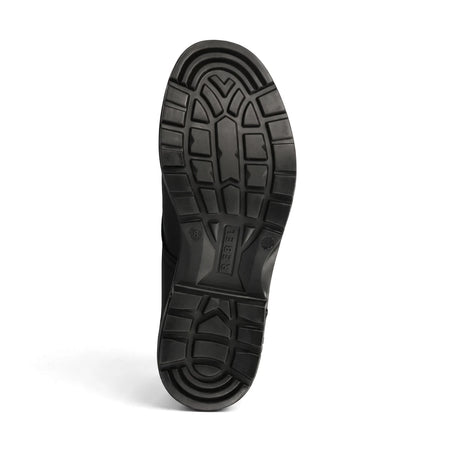 Overhead view of a black Urban Retro Vellie safety shoe sole, featuring a robust, non-slip tread pattern and 'REBEL'