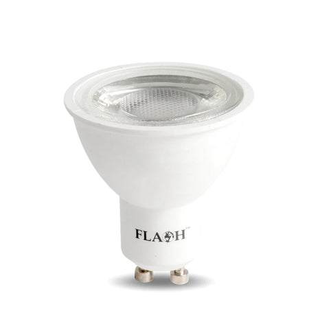 White GU10 7W LED bulb with a clear textured lens and two silver contacts, ideal for energy-efficient lighting.
