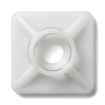 White plastic square cable tie mount pad with a central circular opening for securing cables.
