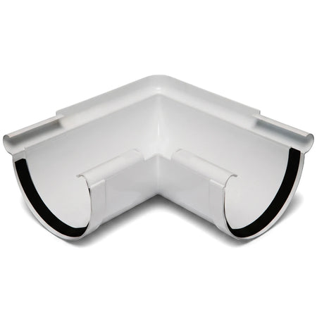 White PVC Vynadeep 90-degree external gutter angle for rainwater systems, shown from an overhead perspective to highlight