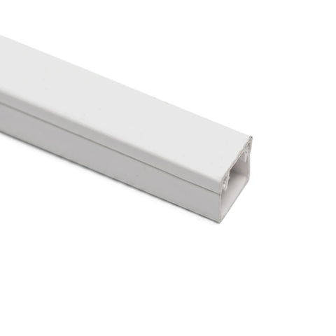 White square PVC electrical cable trunking, photographed from an angle, showcasing its protective channel design.