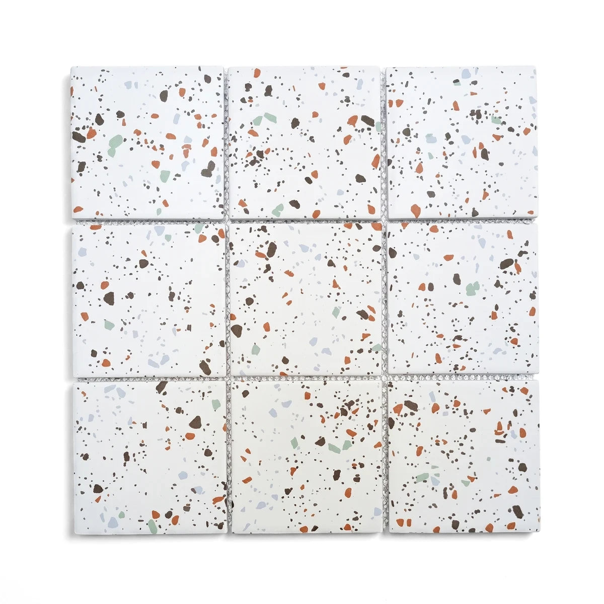 White terrazzo mosaic tile featuring colorful speckles in a 3x3 grid pattern, suitable for flooring or wall applications.