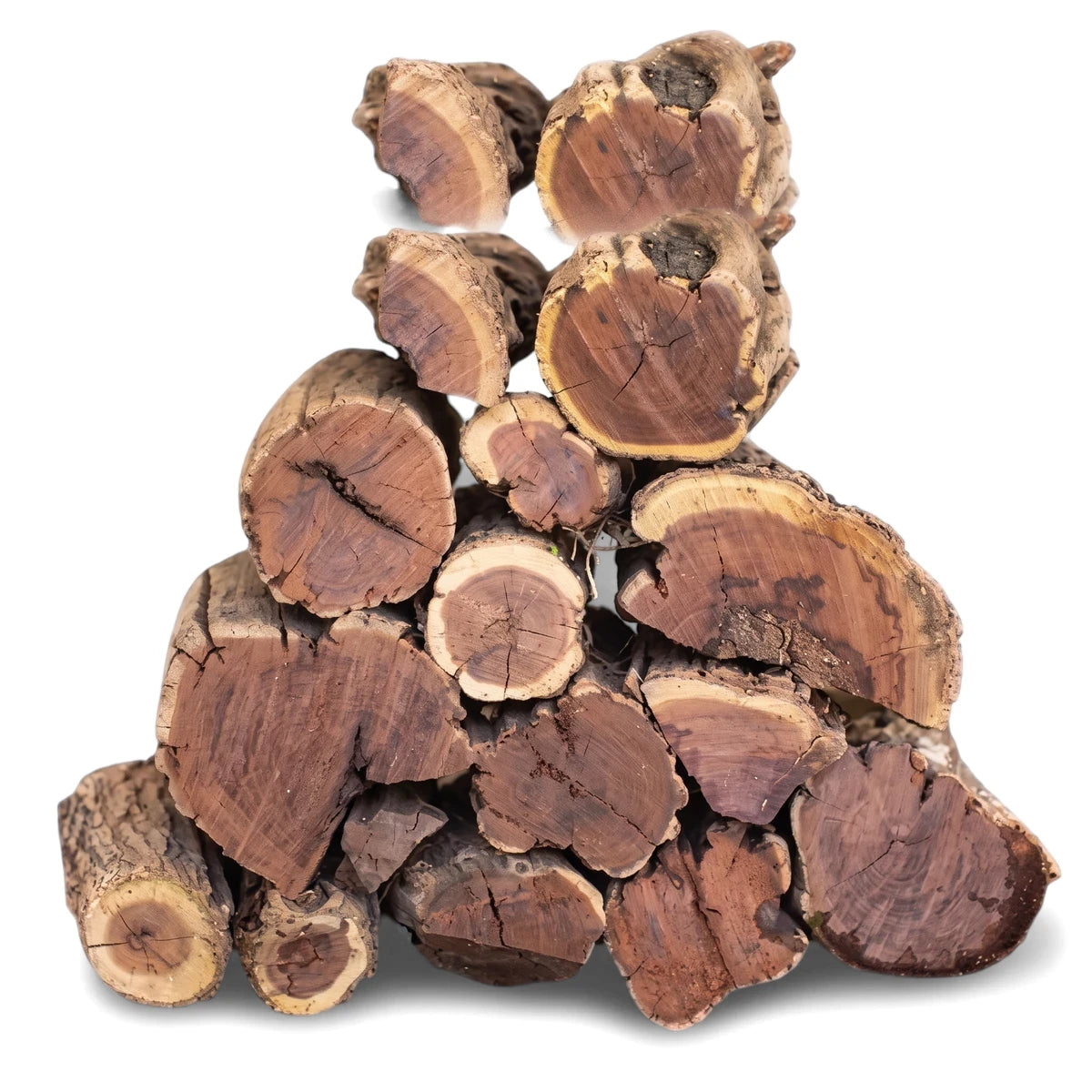 A stack of natural brown wood sekelbos logs with visible growth rings and bark texture, neatly piled for firewood.