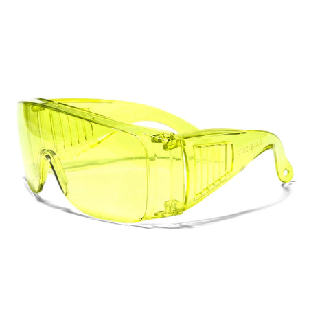 Bright yellow transparent plastic wrap-around safety glasses, shown from an angled perspective, offering eye protection.