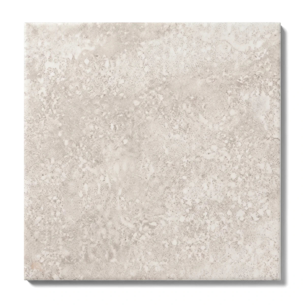Close-up of a Zorah Bone 40X40Cm Tile, showcasing its textured light beige surface and square shape, ideal for contemporary